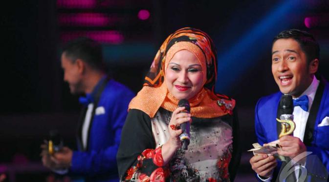 Pada konser Grand Final D'Academy, Camelia Malik mendendangkan lagu yang dipopulerkan sendiri olehnya, Segudang Rindu, Jakarta, Jumat (30/5/2014) (Liputan6.com/Miftahul Hayat).