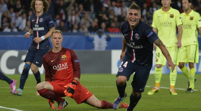 Selebrasi Marco Verratti (tengah), usai menjebol gawang Barcelona di laga kedua Liga Champions 2014-2015 Grup F di Stadion Parc des Princes, Paris (1/10/2014). (AFP PHOTO/Miguel Medina)