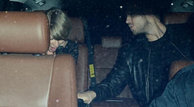 Taylor Swift dan Calvin Harris saat meninggalkan klub malam di daerah Hollywood Barat. (foto: Mirror.co.uk)