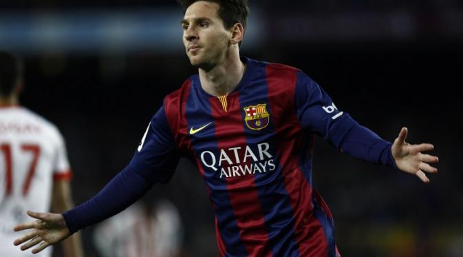 Lionel Messi (Barcelona) merayakan golnya ke gawang Almeria (QUIQUE GARCIA / AFP)