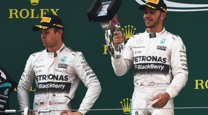 Lewis Hamilton- Nico Rosberg AFP PHOTO / Greg BAKER