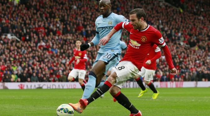 Juan Mata mencetak gol ketiga bagi Manchester United (Reuters / Jason Cairnduff)