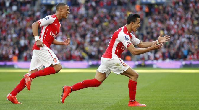 Selebrasi striker Alexis Sanches usai mencetak gol pembuka di menit ke-40