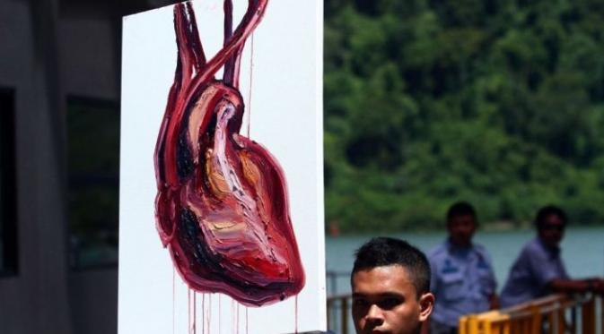 Lukisan Jantung berjudul 'One heart, one feeling in love' | via: abc. net.au