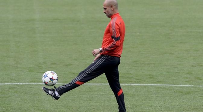 Kehadiran Pep Guardiola membuat Manuel Pellegrini tergusur dari posisinya di kepelatihan ManCity.(AFP/Josep Lagho)