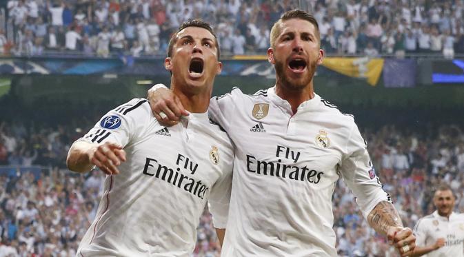 Cristiano Ronaldo merayakan golnya bersama Sergio Ramos. (Reuters / Juan Medina)