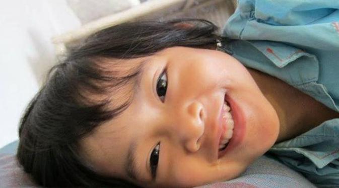 Senyum Angeline saat balita begitu menggemaskan. (Facebook/Find Angeline - Bali's Missing Child)