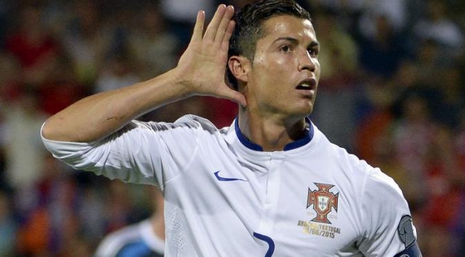 Cristiano Ronaldo mencetak hat-trick saat Portugal mengalahkan Armenia 3-2 dalam lanjutan kualifikasi Piala Eropa 2016 Grup I (KAREN MINASYAN/AFP)