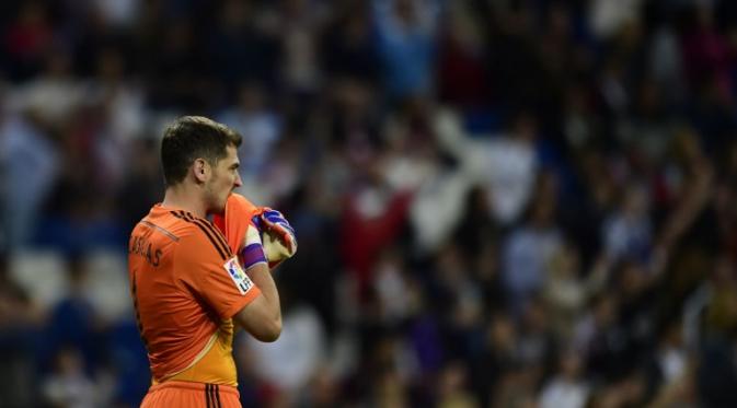 Iker Casillas bakal digusur oleh David De Gea (AFP PHOTO / PIERRE-PHILIPPE MARCOU)