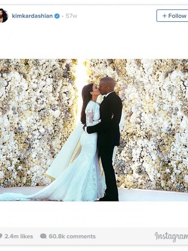 Foto pernikahan Kim Kardashian dan Kanye West yang sempat berhasil memecahkan rekor tanda like di Instagram. (foto: usmagazine)