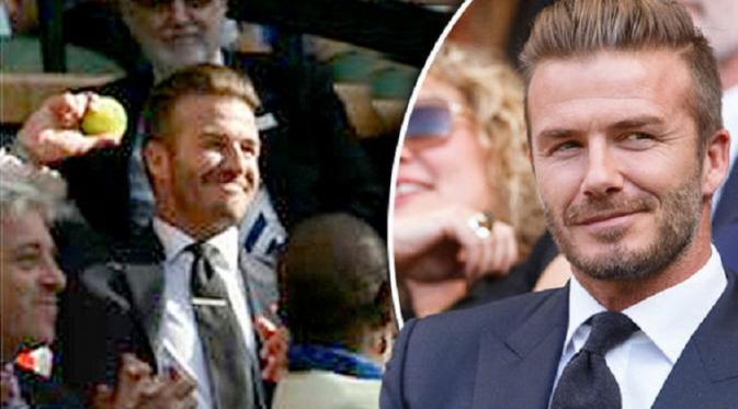 David Beckham dengan sigap menangkap bola tenis yang mengarah ke arahnya (Express)