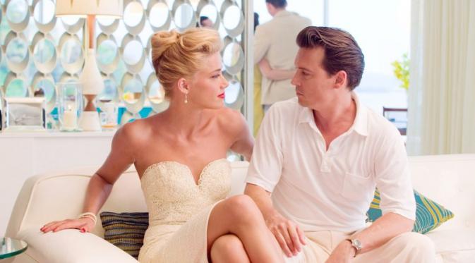 Johnny Depp dan Amber Heard (via pagesix.com)