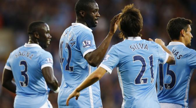 Yaya Toure setelah mencetak gol melawan WBA