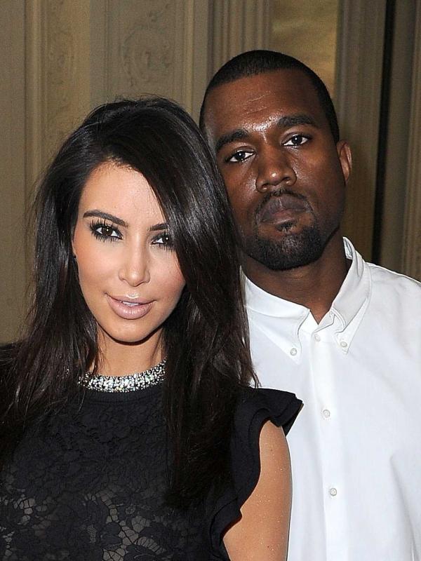 Kim Kardashian dan Kanye West (via businessinsider.com)