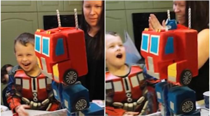 Kue ulang tahun berbentuk robot Optimus Prime. (Daily Mail)