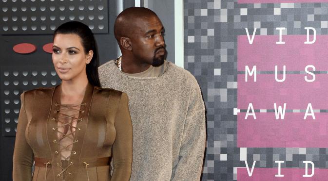 Kim Kardashian dan Kanye West (Bintang/EPA)