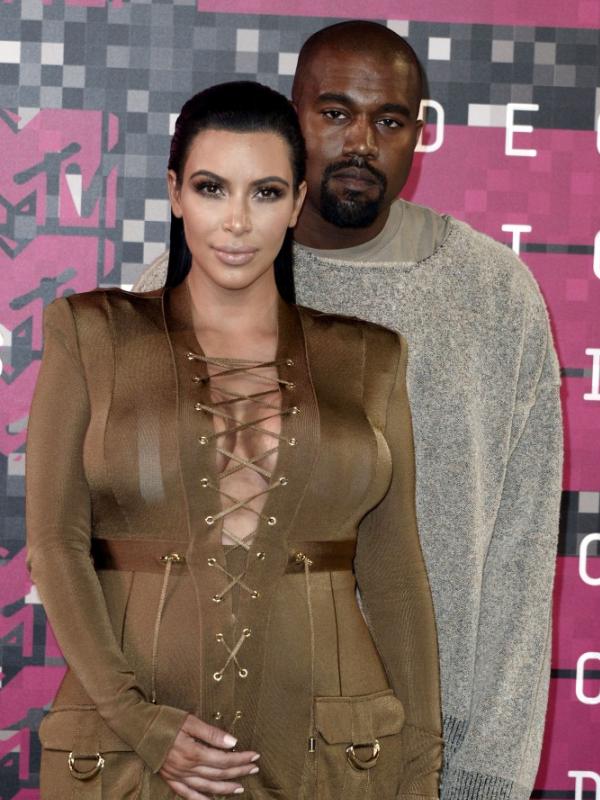 Kim Kardashian dan Kanye West. (Bintang/EPA)