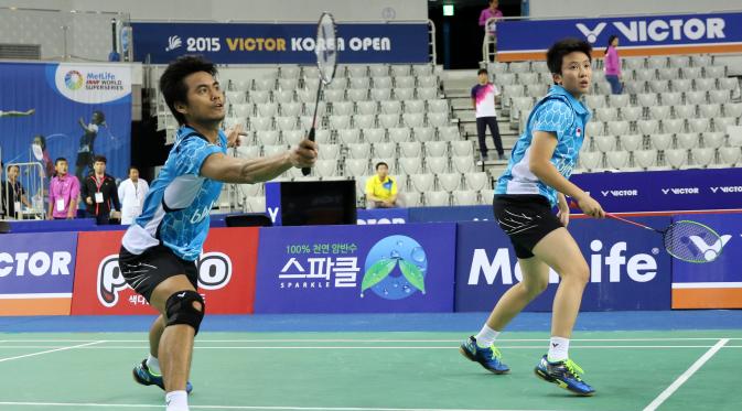 Ganda campuran Tontowi Ahmad/Liliyana Natsir melangkah ke semifinal Korea Open Super Series 2015, Jumat (18/9/2015). (Liputan6.com/Humas PP PBSI)