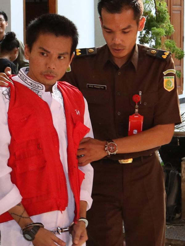 Muncikari RA kembali menjalani persidangan di Pengadilan Negeri Jakarta Selatan, Selasa (22/9/2015). [Foto: Herman Zakaria/Liputan6.com]